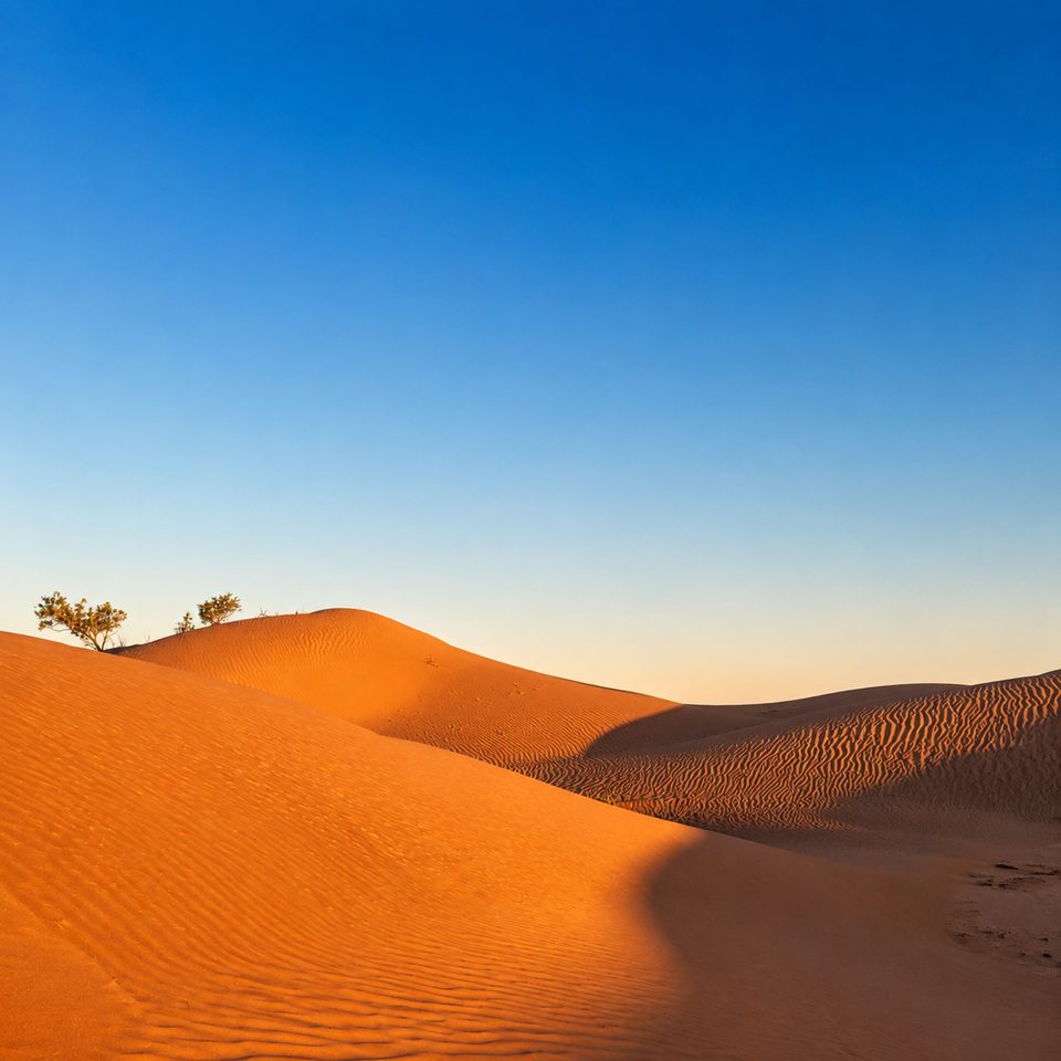Golden dunes of the Moroccan Sahara at sunset